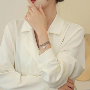 Elegant double-layered silver heart bracelet with metal beads and fine link chain
