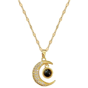 Gold moon pendant necklace with micro-projecting stone and sparkling zircon accents