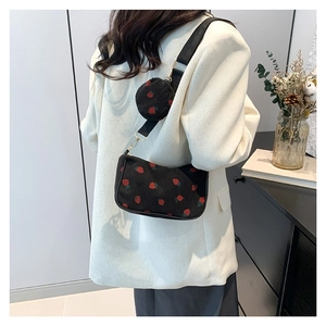 Floral corduroy hobo bag with strawberry print and small matching round pouch charm
