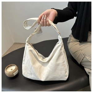 Minimalist white soft hobo tote bag with wide shoulder strap for women daily casual use
