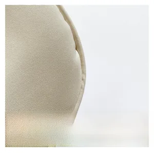 Close-up of premium beige woven fabric texture and high-quality leather edge stitching
