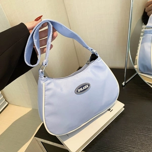 Light blue nylon hobo shoulder bag with white piping and logo, minimalist Korean style