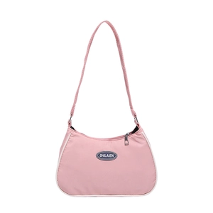 Pink nylon crescent shoulder bag with white piping and shilaien logo on white background