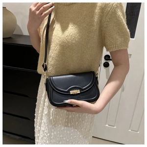 Chic black leather crossbody square bag with gold lock buckle and adjustable shoulder strap