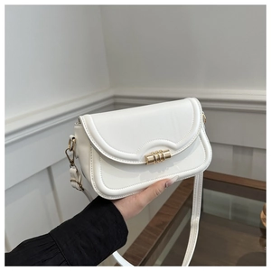 Structured white PU leather crossbody bag with golden hardware and adjustable strap