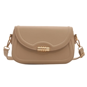 Elegant beige leather crossbody bag with gold cylindrical clasp and quilted edge details