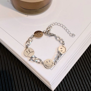 Titanium steel bracelet with silver chain and hollow smiley and sad face charms