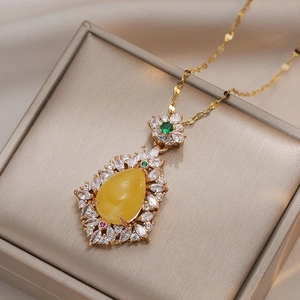 Elegant gold titanium steel necklace with a waterdrop yellow chalcedony pendant for women