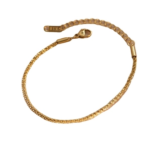 Minimalist gold titanium steel star twist bracelet with lobster clasp and K18 tag