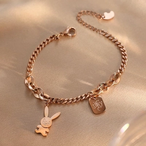 Rose gold titanium steel bracelet featuring a cute rabbit charm and STRY rectangle tag