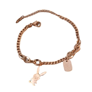 Rose gold titanium steel bracelet featuring a cute rabbit charm and SHY engraved tag