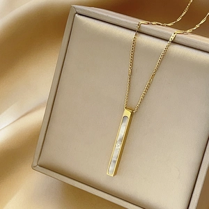 Minimalist long bar pendant necklace in gold finish with elegant mother of pearl inlay