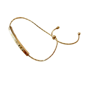 Gold adjustable titanium steel bracelet with Lover Dream engraved bar and slider bead