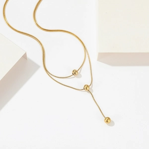Minimalist double layer gold snake chain necklace with polished beads in Y-shape style