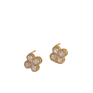 Elegant gold four-leaf clover stud earrings featuring sparkling zircon crystal petals
