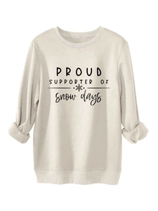 Detail of cream fleece sweatshirt featuring PROUD SUPPORTER OF snow days graphic print