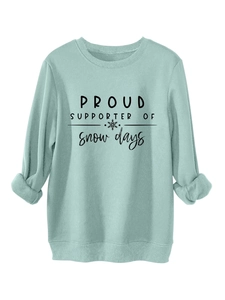 Close-up of mint green fleece sweatshirt with Proud Supporter of Snow Days print