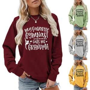 Detail view of the long-sleeve slogan sweatshirt in burgundy, green, grey, and yellow options