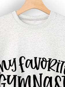 Close-up of My Favorite Gymnast print on a gray crewneck sweatshirt with ribbed collar detail