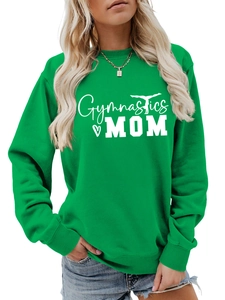Close-up of green Gymnastics MOM sweatshirt featuring white heart and gymnast graphic