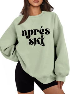 Detail eines salbeigrünen Apres-Ski-Sweatshirts mit dickem Baumwollstoff und Rippbündchen