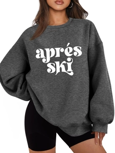 Detailansicht des weichen dunkelgrauen Plüsch-Sweatshirts mit weißem apres ski-Schriftzug