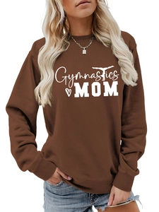 Detail of Gymnastics Mom text and gymnast silhouette on coffee brown sweatshirt fabric