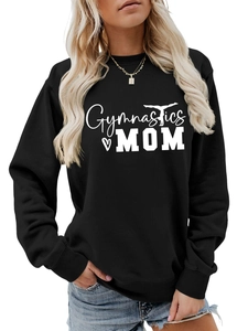 Close-up of Gymnastics MOM white print on comfortable black crewneck sweatshirt