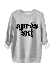 Details des grauen Après-Ski-Sweatshirts mit dickem weißem Fleecefutter am Ärmel