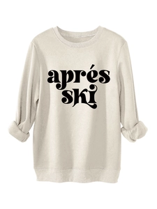 Detail von Aprés Ski Aufdruck und Rippbündchen am beigen Plüsch-Sweatshirt für Damen