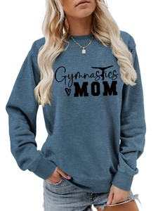 Close-up of Gymnastics Mom text and silhouette print on blue grey crewneck sweatshirt