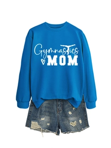 Flat lay of royal blue gymnastics mom sweatshirt paired with ripped denim shorts