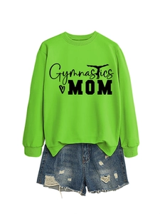 Flat lay of neon green Gymnastics Mom sweatshirt with heart and athlete silhouette