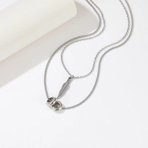 Double-layered titanium steel necklace with feather pendant and interlocking rings