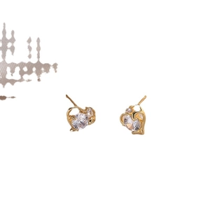 Titanium steel gold heart stud earrings with round cubic zirconia and diamond accents