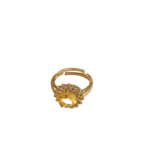 Adjustable gold sunflower ring featuring a yellow gemstone and cubic zirconia accents