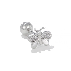 Macro detail of silver butterfly earring with cubic zirconia and screw ball back