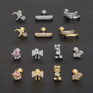 Glitzernde Schleife und Stern Ohrstecker Set in Gold und Silber mit Schraubverschluss