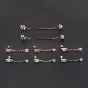 Rose gold and silver tassel chain cartilage earrings with marquise and round cubic zirconia