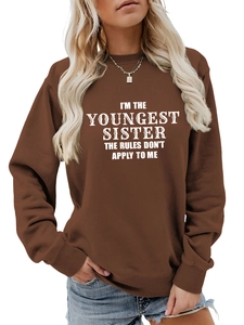 Detail of youngest sister slogan printed on brown crewneck cotton sweatshirt
