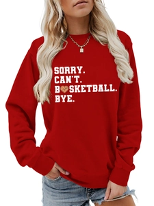 Close-up of red crewneck sweatshirt featuring white basketball letter print details