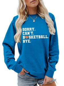 Detail of royal blue sweatshirt with white Sorry Can't Basketball Bye slogan print