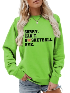 Detail of lime green basketball sweatshirt with ribbed cuffs and slogan graphic