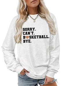Detailed view of the letter print and basketball heart motif on the gray sweatshirt