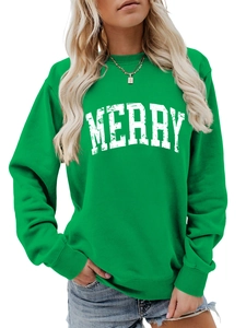 Close-up of green crewneck sweatshirt featuring white distressed MERRY letter printing