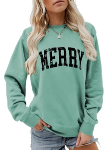 Close-up of mint green crewneck sweatshirt featuring distressed MERRY lettering and ribbed cuffs