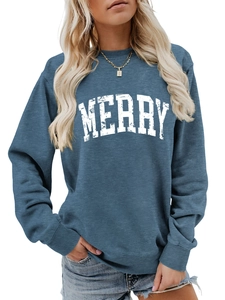 Detail of white MERRY lettering with vintage texture on a dark blue sweatshirt