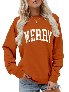 Detail of a burnt orange crewneck sweatshirt featuring white MERRY vintage letter print