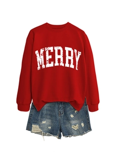 Detail view of red Merry Christmas sweatshirt and distressed denim shorts flat lay