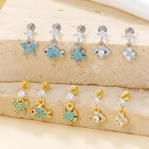 Assorted gold and silver stud earrings set with blue turquoise and cubic zirconia stones